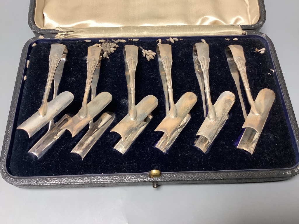 A cased set of six Edwardian silver asparagus tongs, George Howson, Sheffield, 1903